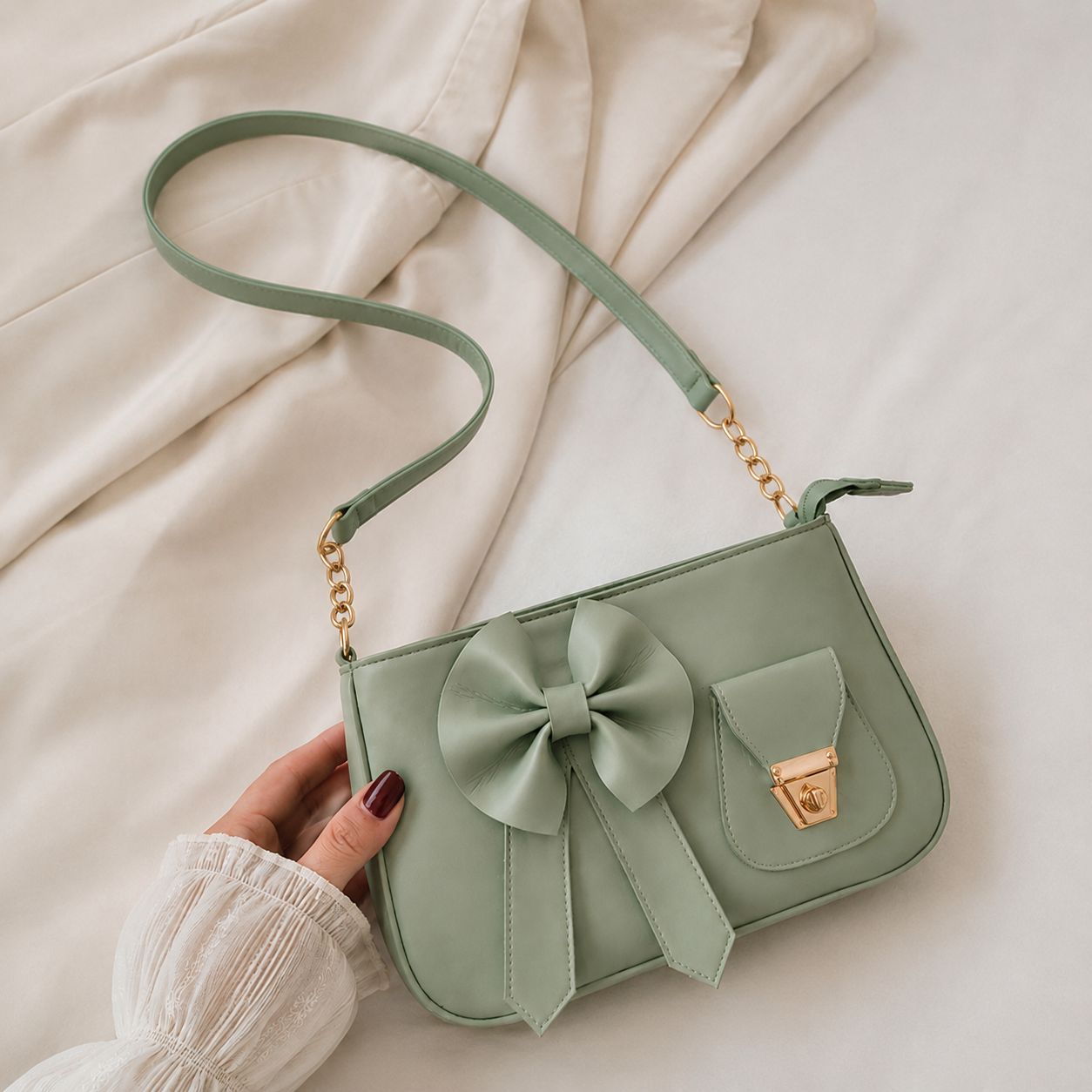 BELLA BOW HAND BAG