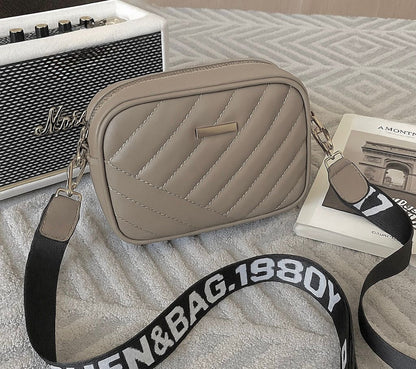 CROSS BODY BAGS