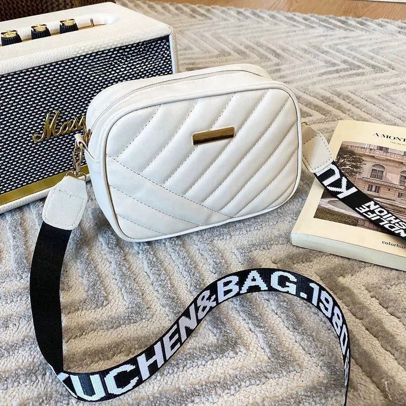 CROSS BODY BAGS
