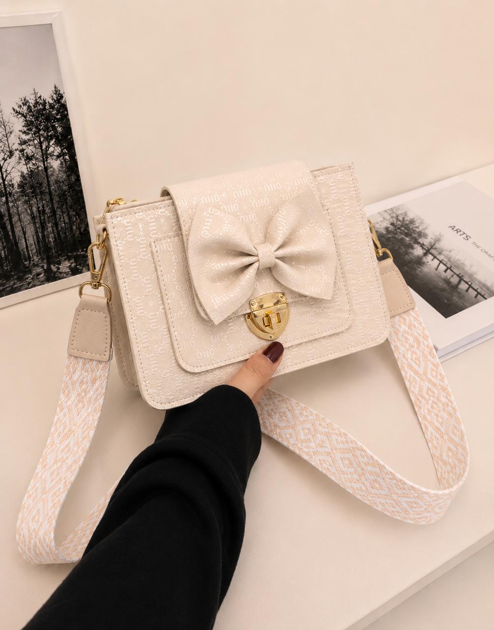 BOW LOCK CROSS-BODY BAG