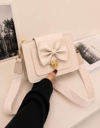 BOW LOCK CROSS-BODY BAG
