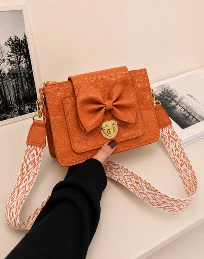 BOW LOCK CROSS-BODY BAG