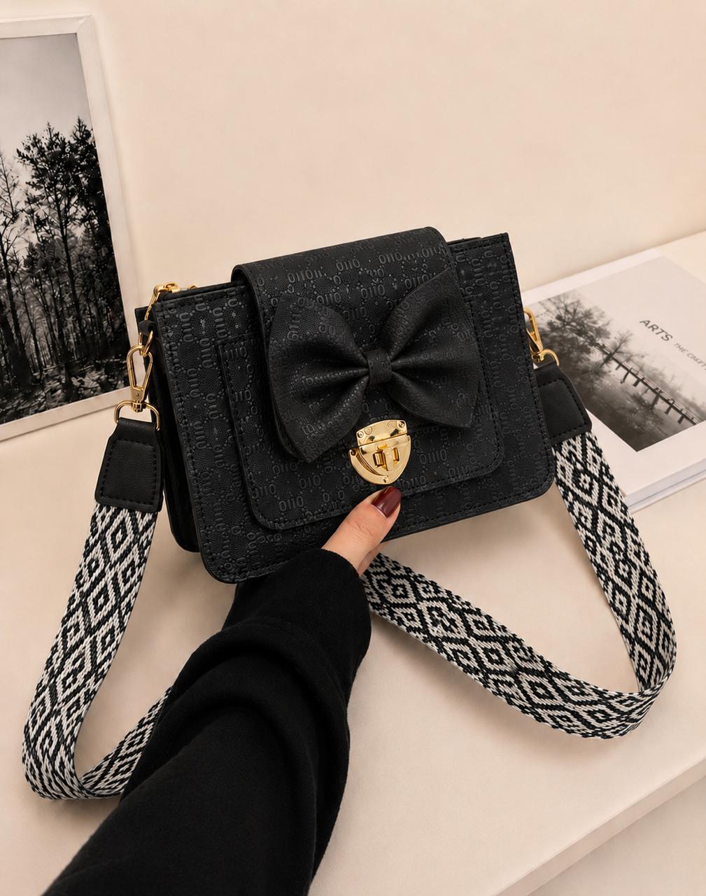 BOW LOCK CROSS-BODY BAG
