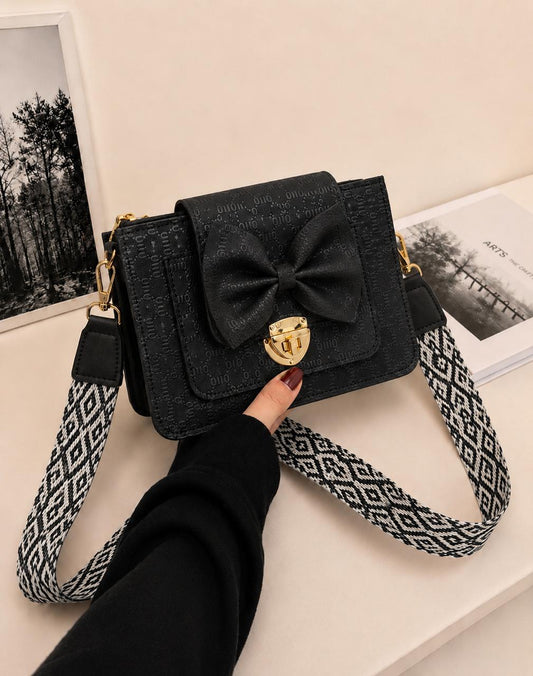 BOW LOCK CROSS-BODY BAG