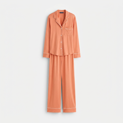 Coral-peach pajama suit, flat-lay